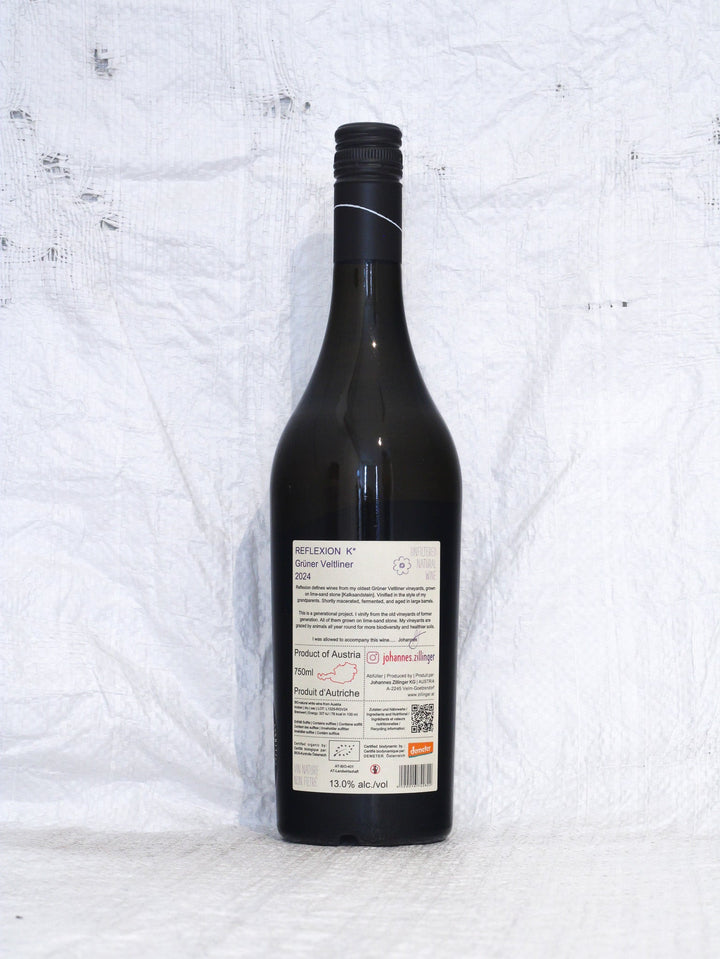 Rückseite der Flasche Reflexion K 2024 von Johannes Zillinger mit Demeter-Zertifizierung und Hinweisen zur biodynamischen Landwirtschaft.