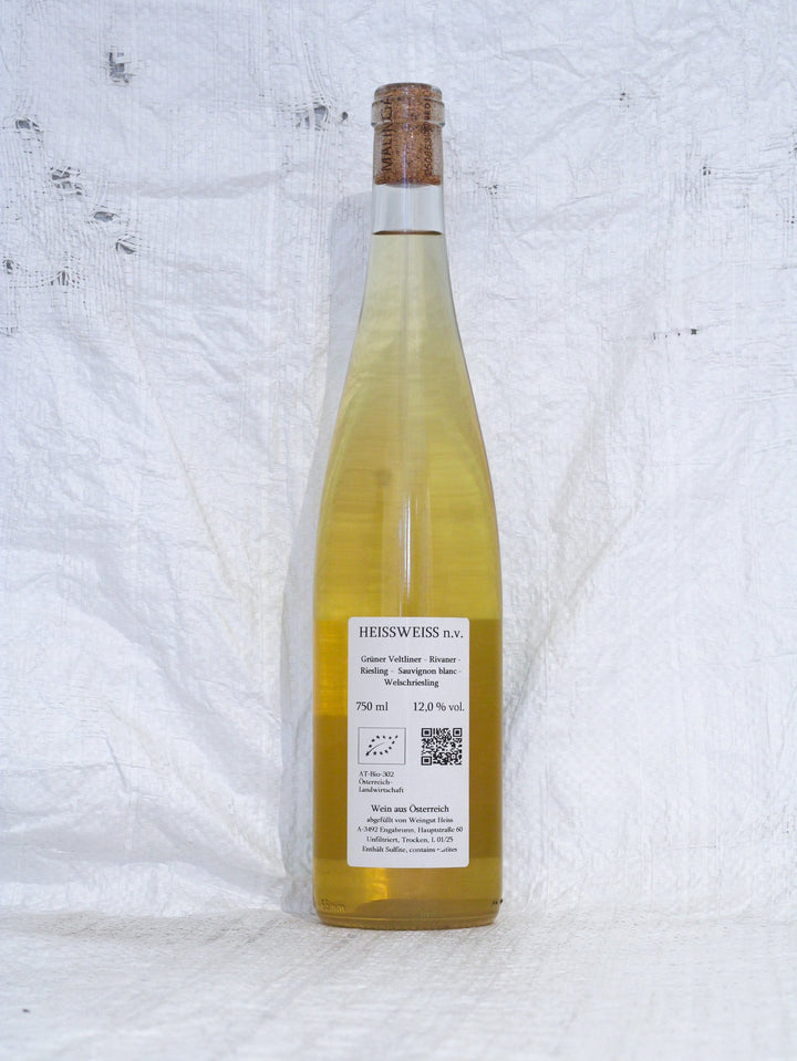 Rückansicht Heissweiss NV von Malinga von Christoph Heiss, Informationen über die Cuvée-Zusammensetzung und unfiltrierte Vinifizierung. 