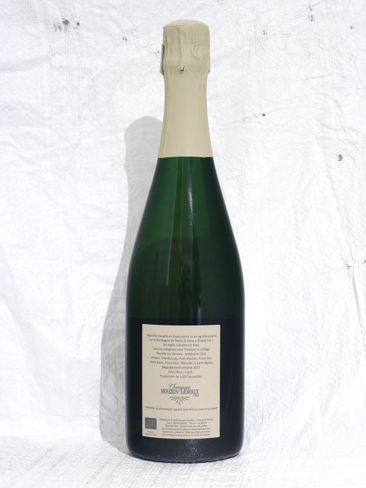 Rückansicht der Les Fervins 2018 Bio Champagnerflasche von Mouzon-Leroux mit Rückenetikett, 7 Champagner-Rebsorten Grand Cru Verzy