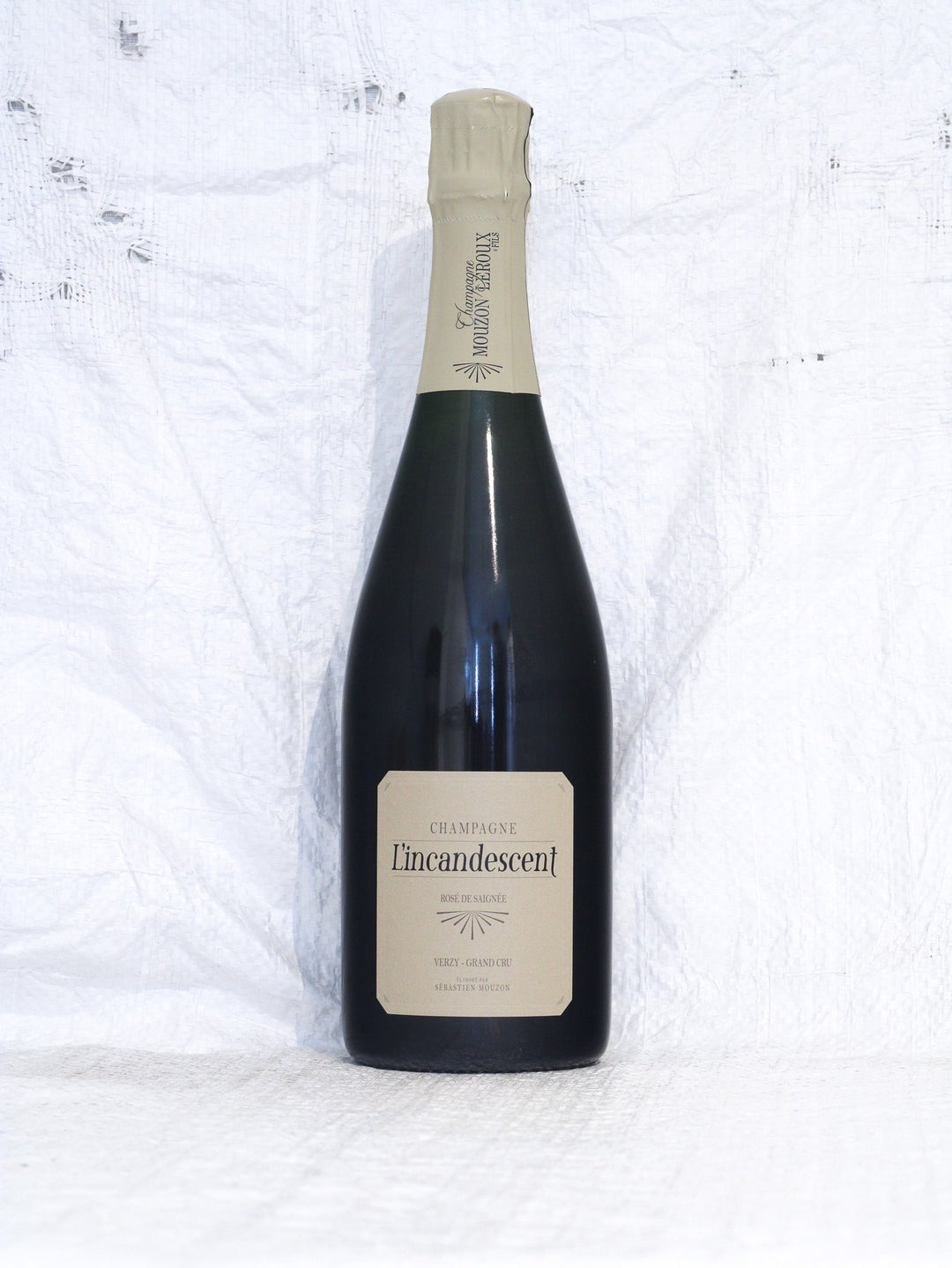 L'Incandescent 2021 Bio Champagner von Mouzon-Leroux – Vorderansicht der Champagnerflasche aus 100% Pinot Noir mit Etikett