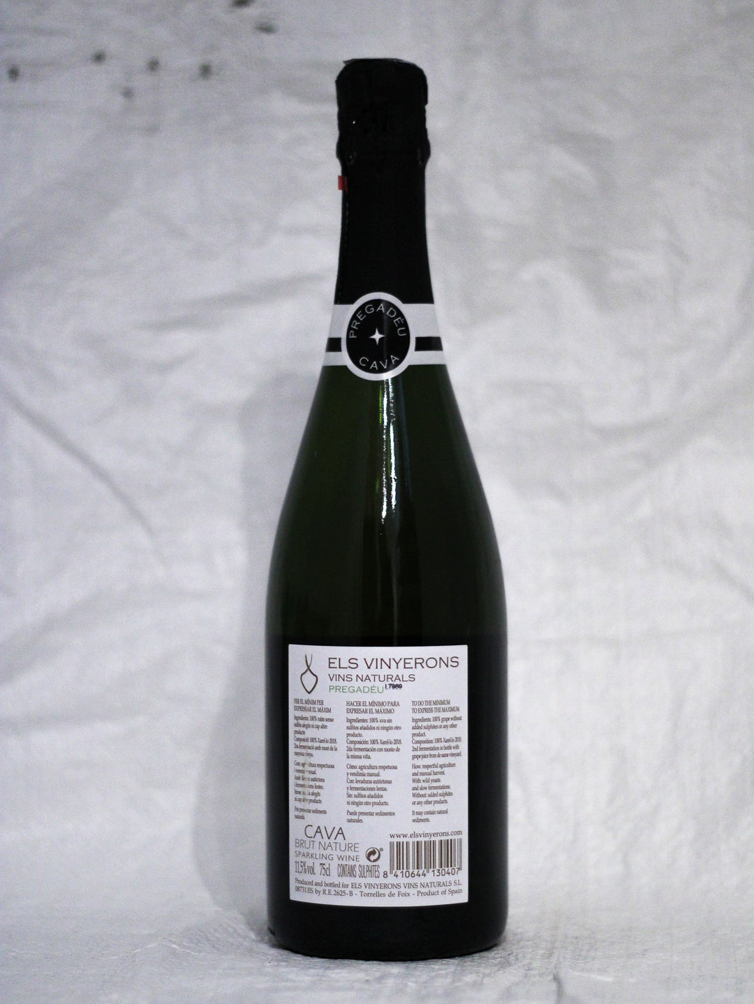 Cava kaufenCava Pregadéu Brut Els Vinyerons Vins Naturals Flasche Hinteransicht – Ungefilterter Schaumwein aus Xarel·lo Trauben Penedès Spanien im Wein Online Shop von Weinskandal. Spanischer Sekt.